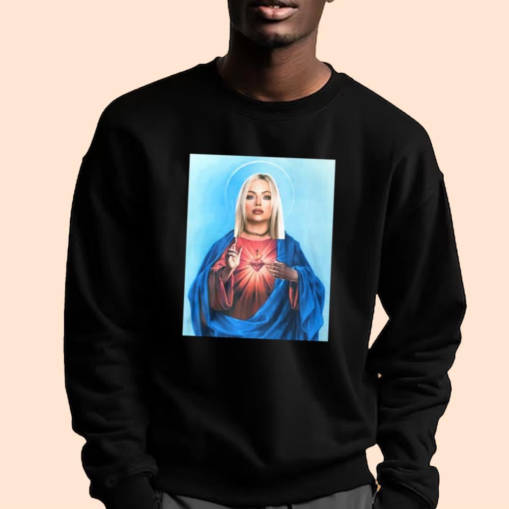 Dominik Wearing Santa Olivia Jesus Shirt