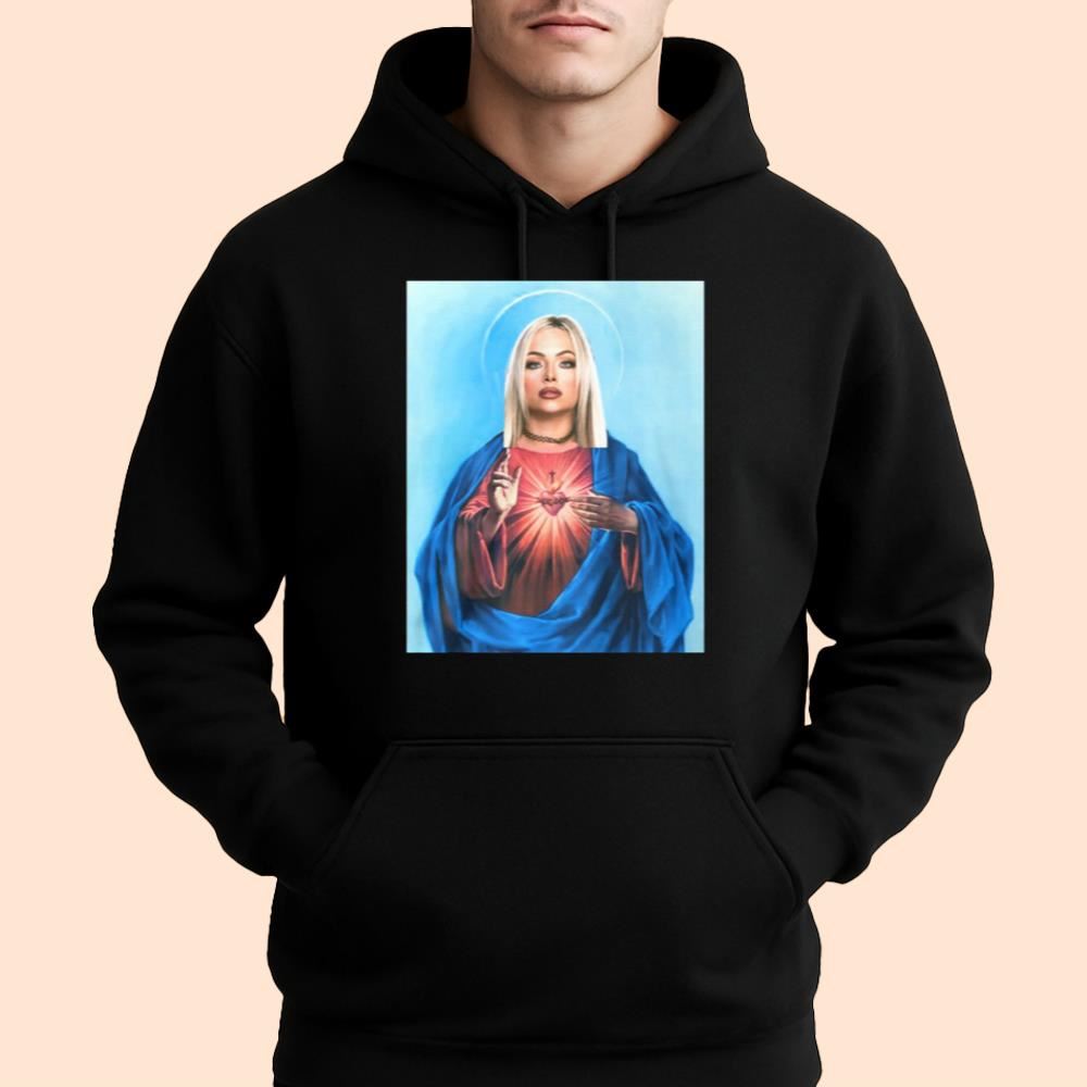 Dominik Wearing Santa Olivia Jesus Shirt